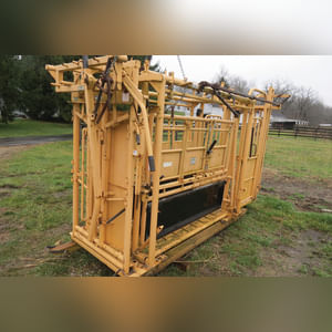 FOR-MOST Model 30 Squeeze Chute with palpation cage on skid