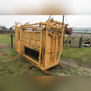 FOR-MOST Model 30 Squeeze Chute with palpation cage on skid