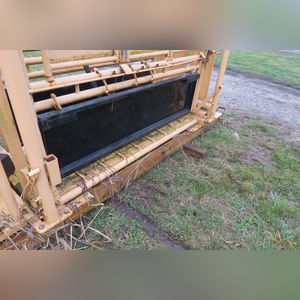 FOR-MOST Model 30 Squeeze Chute with palpation cage on skid