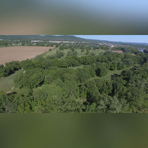 46± acres previously utilized as a driving range as well as a par-3 course