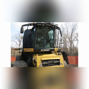 2014 Claas Lexion 740TT Combine, 4WD, CAT C-13 engine, Terra Trac system, 750/65R26 Michelin rears, camera system, AG Leader ready w/ AG Leader screen, corn & soybean threshing system, straw chopper, auto contour, variable-speed  feeder house drive, variable-speed rotor drive, HD 330 BU grain tank, HD 28.2â?? unloader auger, 304 gal. fuel tank, high-end light pkg., deluxe cab w/ instructor seat, 460 sep. hrs., 980 engine hrs., SN C6800185 (powertrain warranty expires 7/12/16)