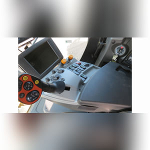 2014 Claas Lexion 740TT Combine, 4WD, CAT C-13 engine, Terra Trac system, 750/65R26 Michelin rears, camera system, AG Leader ready w/ AG Leader screen, corn & soybean threshing system, straw chopper, auto contour, variable-speed  feeder house drive, variable-speed rotor drive, HD 330 BU grain tank, HD 28.2â?? unloader auger, 304 gal. fuel tank, high-end light pkg., deluxe cab w/ instructor seat, 460 sep. hrs., 980 engine hrs., SN C6800185 (powertrain warranty expires 7/12/16)
