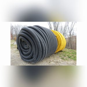 Roll of 4â? & 6â? perforated tile & misc. sticks of tile