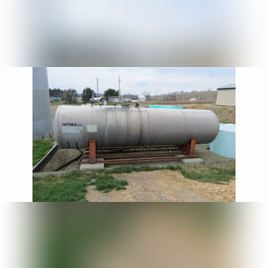 12,000 gal. aluminum tank on steel cradle