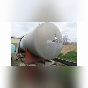 12,000 gal. aluminum tank on steel cradle
