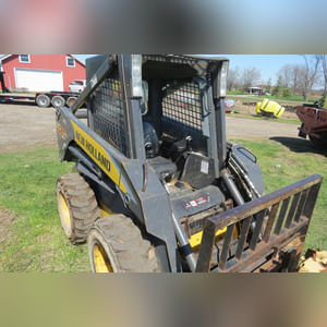 NH Skid Loader 170 with attachments, 1,941 hours, 1 owner, 3rd remote & elec. connect