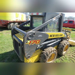 NH Skid Loader 170 with attachments, 1,941 hours, 1 owner, 3rd remote & elec. connect