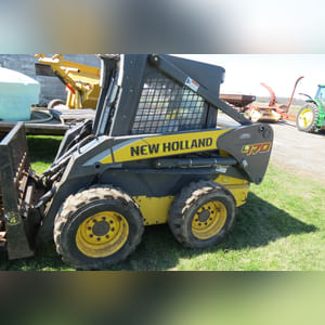 NH Skid Loader 170 with attachments, 1,941 hours, 1 owner, 3rd remote & elec. connect
