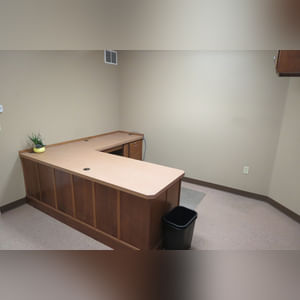 This steel-framed, completely insulated building boasts many custom features making it ideal for multiple purposes.  It includes (3) office areas with built-in work surfaces, air conditioning, and LP gas forced-air heat. (2 offices are 12â??x11â?? & the other is 19â??x11â??.)  The garage/shop area is 75â??x100â?? with concrete floors & approaches, (6) 16â??x16â?? overhead doors with openers, (4) walk-in doors, and loft storage area above offices.  Additional amenities include (2) Reznor LP heaters, Energylogic waste oil furnace, ventilation system with louvered panels, ceiling fans, multiple electrical panels with 220 amp service, several outdoor electrical outlets with pigtail cords to plug in tractors, semis, etc., and a 10 HP 2-stage NAPA air compressor.