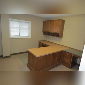 This steel-framed, completely insulated building boasts many custom features making it ideal for multiple purposes.  It includes (3) office areas with built-in work surfaces, air conditioning, and LP gas forced-air heat. (2 offices are 12â??x11â?? & the other is 19â??x11â??.)  The garage/shop area is 75â??x100â?? with concrete floors & approaches, (6) 16â??x16â?? overhead doors with openers, (4) walk-in doors, and loft storage area above offices.  Additional amenities include (2) Reznor LP heaters, Energylogic waste oil furnace, ventilation system with louvered panels, ceiling fans, multiple electrical panels with 220 amp service, several outdoor electrical outlets with pigtail cords to plug in tractors, semis, etc., and a 10 HP 2-stage NAPA air compressor.