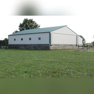 10± acres, home, pole barn, shop building, fenced pastures, and pond. The impressive interior of the home boasts 4 bedrooms and 3 full baths. The master suite is 16â??x16â?? with a large walk-in closet. The master bath has a double sink and a large custom shower. The 22â??x14â?? eat-in kitchen has custom cabinets, granite counter tops, and a brick-front raised fireplace. The large main level also includes the 20â??x14â?? living room with fireplace, 18â??x16â?? family room, 14â??x12â?? office area, mud room, and laundry room. This spacious main level floor plan is ideal for the family as well as entertaining. The full basement is partially finished, and the 2-car attached garage includes a large storage area. Other amenities within the home include a Lennox LP gas forced-air furnace, central air, Pella windows, a newer roof, cathedral ceilings, ceramic tile and wood flooring, ceiling fans, and a Radionon system. The exterior is beautifully landscaped with mature trees, colorful perennials, a small orchard and grape vineyard, a large play area, and a ½ acre stocked pond. The 60â??x50â?? pole barn with walk-in door and 14â??-high end slider includes grooved concrete, maternity pens, custom Gingway gates, a working chute, and 4 individual turn-out pens. There are 6 fenced and cross-fenced pasture areas, each with its own Ritchie waterer. The 34â??x32â?? shop building has a concrete floor, porch, and walk-in and overhead doors.