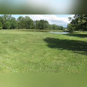 10± acres, home, pole barn, shop building, fenced pastures, and pond. The impressive interior of the home boasts 4 bedrooms and 3 full baths. The master suite is 16â??x16â?? with a large walk-in closet. The master bath has a double sink and a large custom shower. The 22â??x14â?? eat-in kitchen has custom cabinets, granite counter tops, and a brick-front raised fireplace. The large main level also includes the 20â??x14â?? living room with fireplace, 18â??x16â?? family room, 14â??x12â?? office area, mud room, and laundry room. This spacious main level floor plan is ideal for the family as well as entertaining. The full basement is partially finished, and the 2-car attached garage includes a large storage area. Other amenities within the home include a Lennox LP gas forced-air furnace, central air, Pella windows, a newer roof, cathedral ceilings, ceramic tile and wood flooring, ceiling fans, and a Radionon system. The exterior is beautifully landscaped with mature trees, colorful perennials, a small orchard and grape vineyard, a large play area, and a ½ acre stocked pond. The 60â??x50â?? pole barn with walk-in door and 14â??-high end slider includes grooved concrete, maternity pens, custom Gingway gates, a working chute, and 4 individual turn-out pens. There are 6 fenced and cross-fenced pasture areas, each with its own Ritchie waterer. The 34â??x32â?? shop building has a concrete floor, porch, and walk-in and overhead doors.