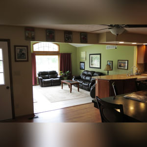 10± acres, home, pole barn, shop building, fenced pastures, and pond. The impressive interior of the home boasts 4 bedrooms and 3 full baths. The master suite is 16â??x16â?? with a large walk-in closet. The master bath has a double sink and a large custom shower. The 22â??x14â?? eat-in kitchen has custom cabinets, granite counter tops, and a brick-front raised fireplace. The large main level also includes the 20â??x14â?? living room with fireplace, 18â??x16â?? family room, 14â??x12â?? office area, mud room, and laundry room. This spacious main level floor plan is ideal for the family as well as entertaining. The full basement is partially finished, and the 2-car attached garage includes a large storage area. Other amenities within the home include a Lennox LP gas forced-air furnace, central air, Pella windows, a newer roof, cathedral ceilings, ceramic tile and wood flooring, ceiling fans, and a Radionon system. The exterior is beautifully landscaped with mature trees, colorful perennials, a small orchard and grape vineyard, a large play area, and a ½ acre stocked pond. The 60â??x50â?? pole barn with walk-in door and 14â??-high end slider includes grooved concrete, maternity pens, custom Gingway gates, a working chute, and 4 individual turn-out pens. There are 6 fenced and cross-fenced pasture areas, each with its own Ritchie waterer. The 34â??x32â?? shop building has a concrete floor, porch, and walk-in and overhead doors.