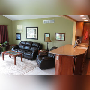 10± acres, home, pole barn, shop building, fenced pastures, and pond. The impressive interior of the home boasts 4 bedrooms and 3 full baths. The master suite is 16â??x16â?? with a large walk-in closet. The master bath has a double sink and a large custom shower. The 22â??x14â?? eat-in kitchen has custom cabinets, granite counter tops, and a brick-front raised fireplace. The large main level also includes the 20â??x14â?? living room with fireplace, 18â??x16â?? family room, 14â??x12â?? office area, mud room, and laundry room. This spacious main level floor plan is ideal for the family as well as entertaining. The full basement is partially finished, and the 2-car attached garage includes a large storage area. Other amenities within the home include a Lennox LP gas forced-air furnace, central air, Pella windows, a newer roof, cathedral ceilings, ceramic tile and wood flooring, ceiling fans, and a Radionon system. The exterior is beautifully landscaped with mature trees, colorful perennials, a small orchard and grape vineyard, a large play area, and a ½ acre stocked pond. The 60â??x50â?? pole barn with walk-in door and 14â??-high end slider includes grooved concrete, maternity pens, custom Gingway gates, a working chute, and 4 individual turn-out pens. There are 6 fenced and cross-fenced pasture areas, each with its own Ritchie waterer. The 34â??x32â?? shop building has a concrete floor, porch, and walk-in and overhead doors.