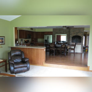 10± acres, home, pole barn, shop building, fenced pastures, and pond. The impressive interior of the home boasts 4 bedrooms and 3 full baths. The master suite is 16â??x16â?? with a large walk-in closet. The master bath has a double sink and a large custom shower. The 22â??x14â?? eat-in kitchen has custom cabinets, granite counter tops, and a brick-front raised fireplace. The large main level also includes the 20â??x14â?? living room with fireplace, 18â??x16â?? family room, 14â??x12â?? office area, mud room, and laundry room. This spacious main level floor plan is ideal for the family as well as entertaining. The full basement is partially finished, and the 2-car attached garage includes a large storage area. Other amenities within the home include a Lennox LP gas forced-air furnace, central air, Pella windows, a newer roof, cathedral ceilings, ceramic tile and wood flooring, ceiling fans, and a Radionon system. The exterior is beautifully landscaped with mature trees, colorful perennials, a small orchard and grape vineyard, a large play area, and a ½ acre stocked pond. The 60â??x50â?? pole barn with walk-in door and 14â??-high end slider includes grooved concrete, maternity pens, custom Gingway gates, a working chute, and 4 individual turn-out pens. There are 6 fenced and cross-fenced pasture areas, each with its own Ritchie waterer. The 34â??x32â?? shop building has a concrete floor, porch, and walk-in and overhead doors.