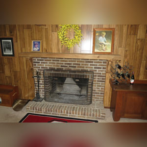 10± acres, home, pole barn, shop building, fenced pastures, and pond. The impressive interior of the home boasts 4 bedrooms and 3 full baths. The master suite is 16â??x16â?? with a large walk-in closet. The master bath has a double sink and a large custom shower. The 22â??x14â?? eat-in kitchen has custom cabinets, granite counter tops, and a brick-front raised fireplace. The large main level also includes the 20â??x14â?? living room with fireplace, 18â??x16â?? family room, 14â??x12â?? office area, mud room, and laundry room. This spacious main level floor plan is ideal for the family as well as entertaining. The full basement is partially finished, and the 2-car attached garage includes a large storage area. Other amenities within the home include a Lennox LP gas forced-air furnace, central air, Pella windows, a newer roof, cathedral ceilings, ceramic tile and wood flooring, ceiling fans, and a Radionon system. The exterior is beautifully landscaped with mature trees, colorful perennials, a small orchard and grape vineyard, a large play area, and a ½ acre stocked pond. The 60â??x50â?? pole barn with walk-in door and 14â??-high end slider includes grooved concrete, maternity pens, custom Gingway gates, a working chute, and 4 individual turn-out pens. There are 6 fenced and cross-fenced pasture areas, each with its own Ritchie waterer. The 34â??x32â?? shop building has a concrete floor, porch, and walk-in and overhead doors.